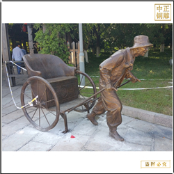 景區(qū)拉車(chē)人物銅雕塑 